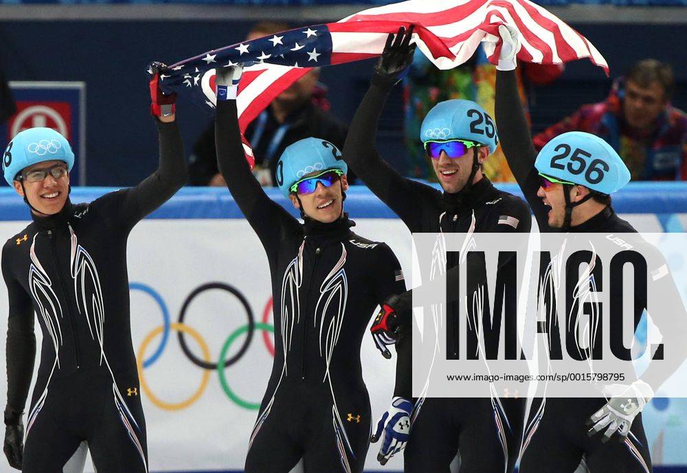 The U.S. team celebrates after winning the silver medal during the short track: men s 5000m relay during the Sochi Winter Olympics on February 21, 2014.. OLY20140221502