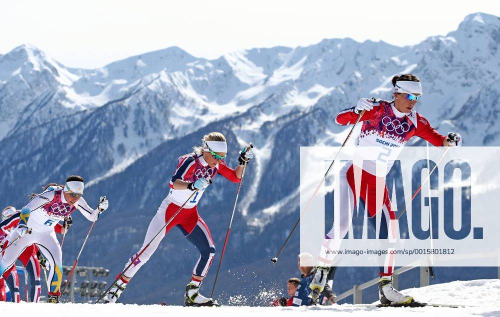 ITAR-TASS: SOCHI, RUSSIA. FEBRUARY 22, 2014. Norway s Marit Bjoergen and Kristin Stoermer Steira (R-L) compete in the women s cross-country skiing 30km mass start free event at the 22nd Winter Olympic Games in Sochi, at the Laura Ski Center. Aufmacher premiumd RE13A9BF