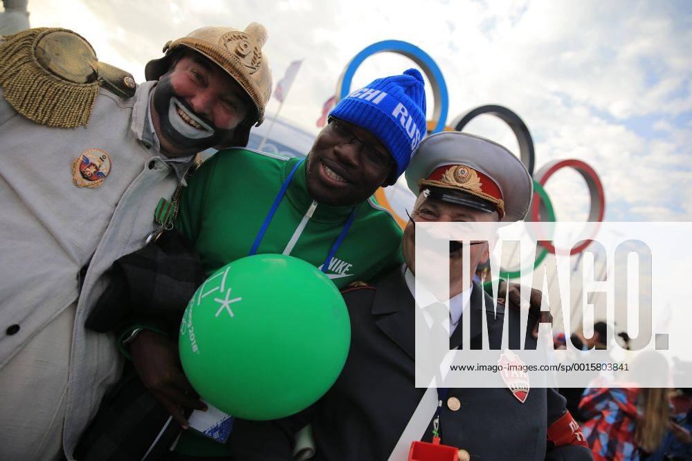 ITAR-TASS: SOCHI, RUSSIA. FEBRUARY 22, 2014. Sports fans wear funny costume in the Coastal Olympic Village during the 22nd Winter Olympic Games in Sochi. RE13A9DE