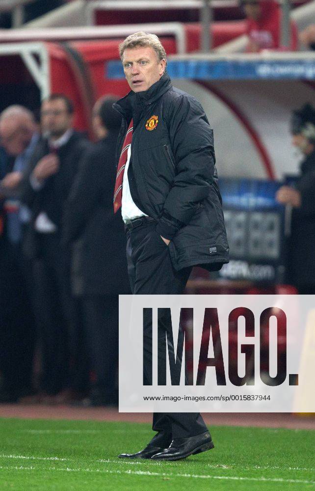 David Moyes, manager of Manchester United looks bewildered - UEFA Champions League First Knockout Round - Olympiacos vs. Manchester United - Karaiskakh Stadium - Athens - Greece - 25th February 2014 - Picture Philip Oldham Sportimage .