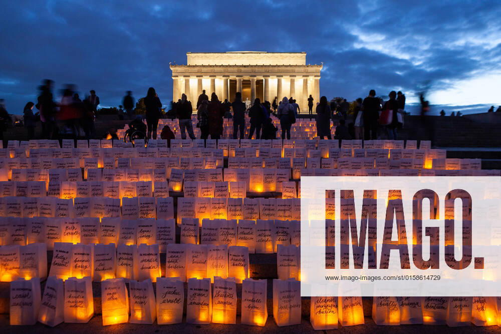 Mother s Day Luminaria at the Lincoln Memorial Hundreds of people attend empowerHER s Mother s Day Luminaria installation at the Lincoln Memorial. Paper bags, each bearing the name of a loved one and a candle, cover the steps in front of the memorial at just after sunset. The bags are a fundraiser for empowerHER, a mentoring organzation for girls who have lost their mothers. Washington DC United States