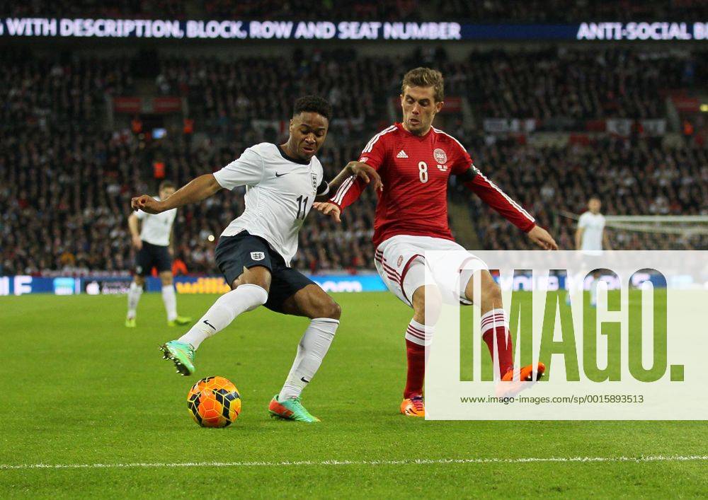 England s Raheem Sterling tussles with Denmark s Jakob Poulsen England v Denmark - International Friendly - Wembley Stadium in London - London - England - 05 03 2014 - .