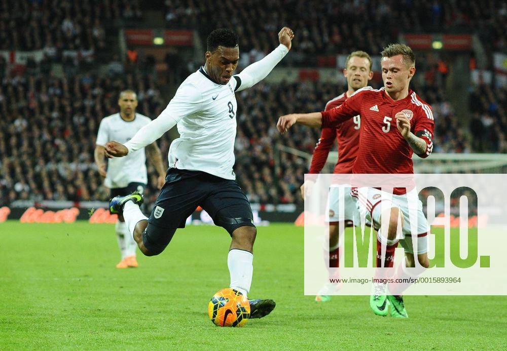 Football - 2014 International Friendly - England vs. Denmark England s Daniel Sturridge at Wembley. Denmark s Peter Ankersen COLORSPORT ANDREW COWIE