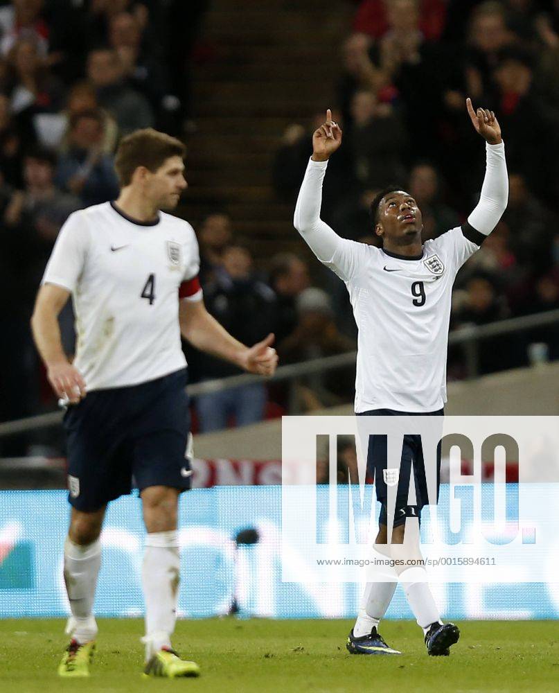 (140306) -- LONDON, March 6, 2014 (Xinhua) -- Daniel Sturridge(R) of England celebrates scoring during an international friendly soccer match between England and Denmark at Wembley Stadium in London, Britain on March 5, 2014. England won 1-0.(Xinhua Wang Lili) (SP)BRITAIN-LONDON-SOCCER-INTERNATIONAL FRIENDLY-ENG VS DEN