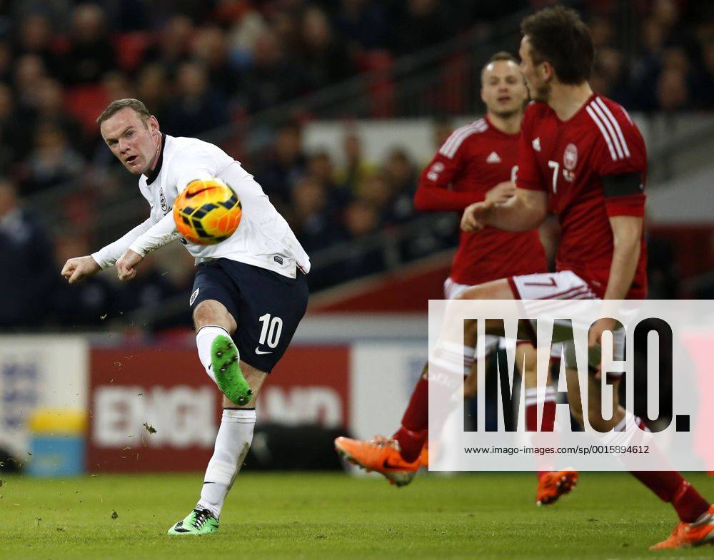 (140306) -- LONDON, March 6, 2014 (Xinhua) -- Wayne Rooney(L) of England shoots during an international friendly soccer match between England and Denmark at Wembley Stadium in London, Britain on March 5, 2014. England won 1-0.(Xinhua Wang Lili) (SP)BRITAIN-LONDON-SOCCER-INTERNATIONAL FRIENDLY-ENG VS DEN