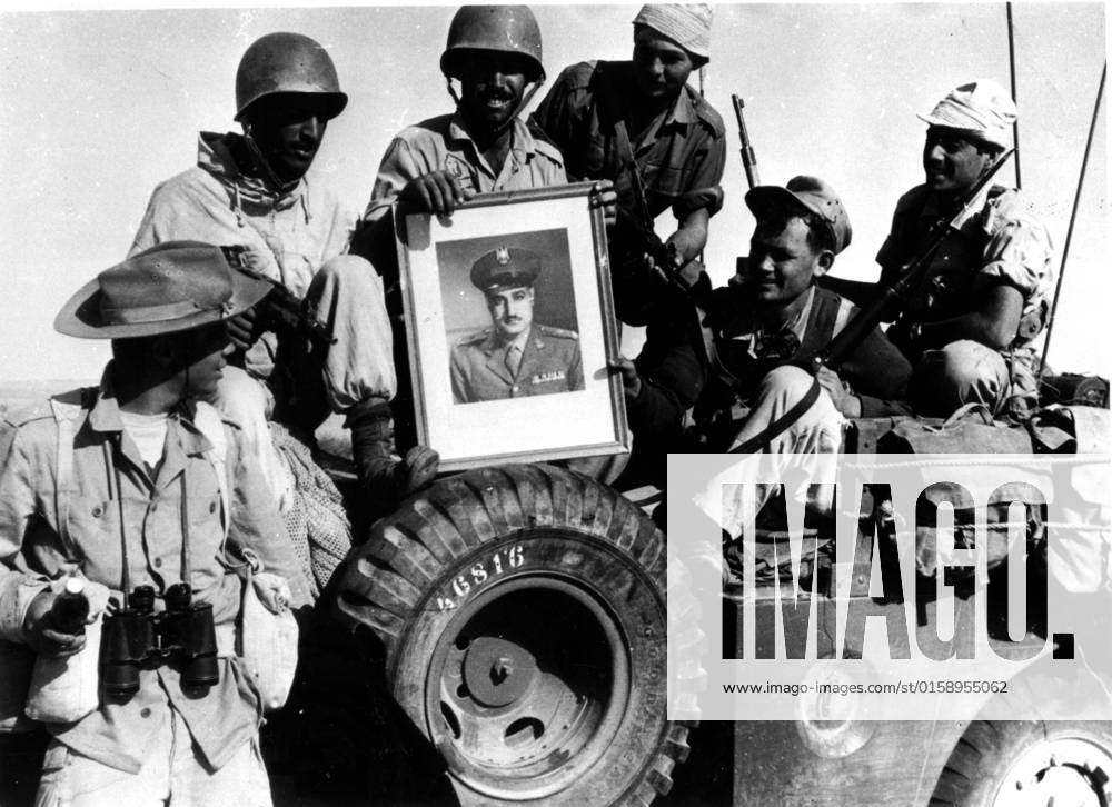 Suez Crisis, Israeli soldiers bringing back a portrait of Nasser as a souvenir Israeli soldiers bringing back a portrait of Nasser as a souvenir 1956 Egypt - Suez Crisis Washington - National Archives