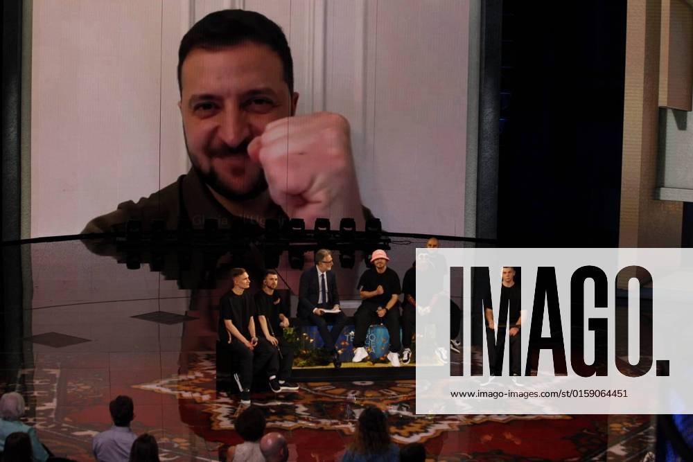 Photo IPP MIPA Milan 15 05 2022 TV broadcast Che Tempo che fa Pictured is the President of Ukraine Volodymyr Zelensky reporting from Kiev as he greets and congratulates the Kalush Orchestra musical group that won the Eurovision Song Contest, seated between them host Fabio Fazio Italy Photo Press World Copyright 0