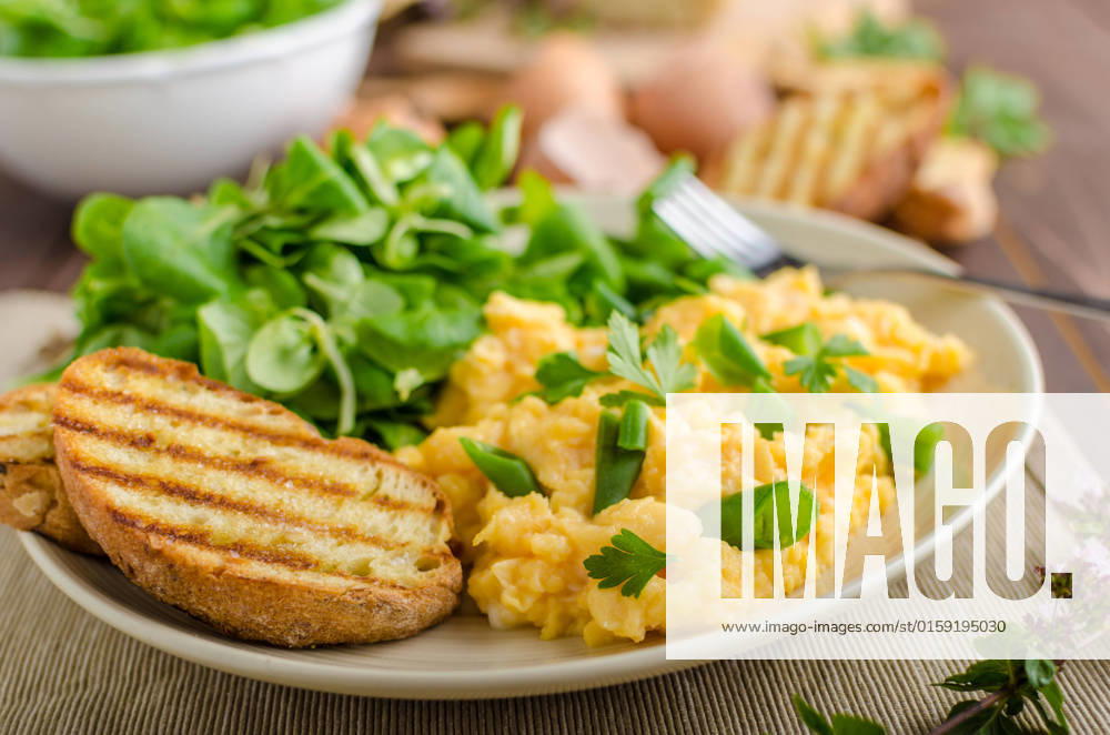Scrambled eggs with beans and salad, baked baguette on a panini , 22988964.jpg, scrambled, eggs, egg, breakfast, food, meal, pan, fresh, toast, fried, bread, lunch, plate, closeup, yellow, delicious, dish, morning, cooked, parsley, fork, healthy, omelet, gourmet, cuisine, background, brunch, white, iron, dinner, traditional, tasty, snack, herbs, bacon, appetizer, green, wooden, frying, skillet, salad, lamb lettuce, lamb, lettuce, bio, organic, rustic, wood, microgreens, parsley,