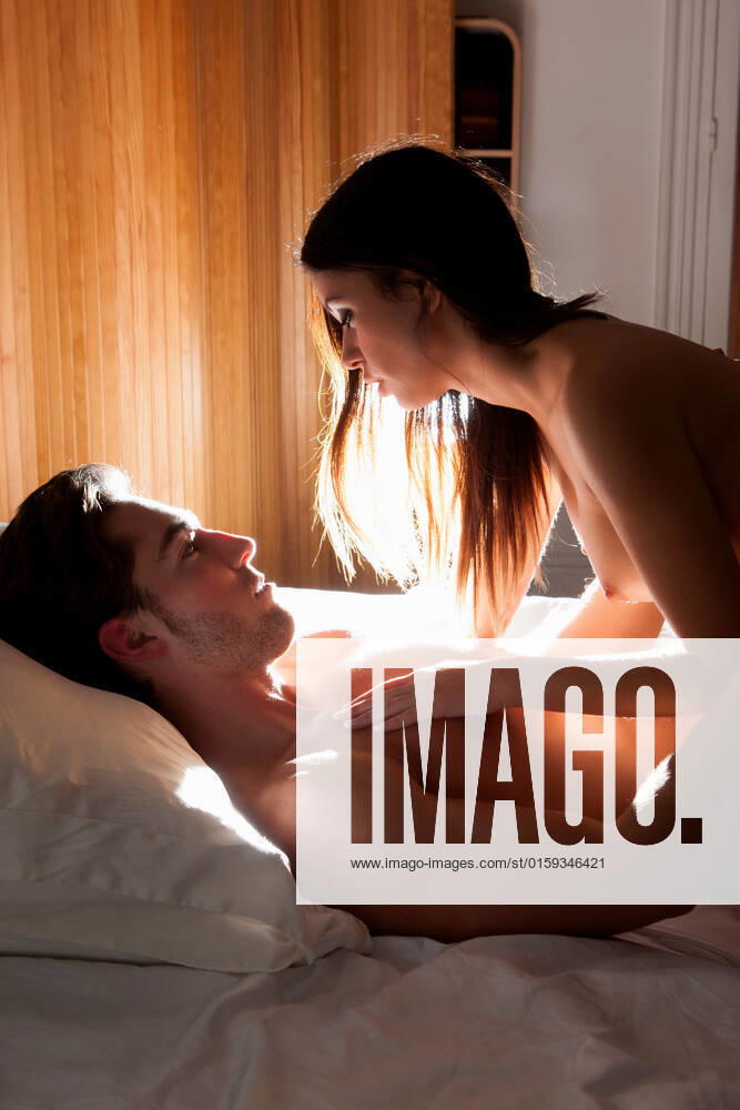 Nude couple laying in bed, 13.02.2013,