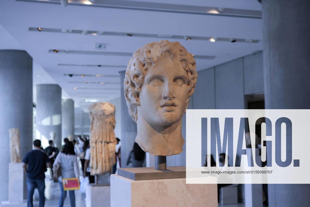 Tourists and locals visit the Acropolis Museum in Athens during International Museum Day Visistors pass by the head of a statue of Alexander the Great in the Acropolis Museum. Tourists and locals visit the Acropolis Museum in Athens and enjoy free entrance as part of the celebrations on International Museum Day. Athens Greece