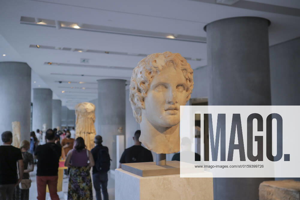 Tourists and locals visit the Acropolis Museum in Athens during International Museum Day Visistors pass by the head of a statue of Alexander the Great in the Acropolis Museum. Tourists and locals visit the Acropolis Museum in Athens and enjoy free entrance as part of the celebrations on International Museum Day. Athens Greece