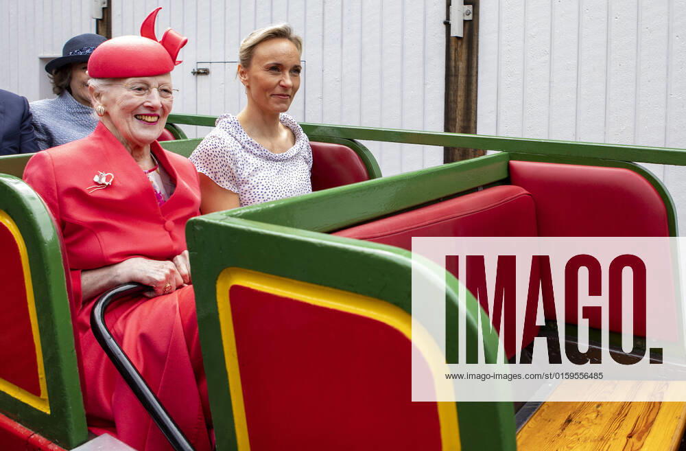 Tivoli Queen Margrethe during her 50th jubilee at the amusement park Tivoli in Copenhagen, Denmark. The Queen at the opening at the Queens costumes, an exhibition by David M.A.P. Palmquits about her 20 yearlong partnership with the Tivoli ballet at the Pantomine theater. Visiting the youth gurads tailor and planting a tree in the parterre garden. Â
