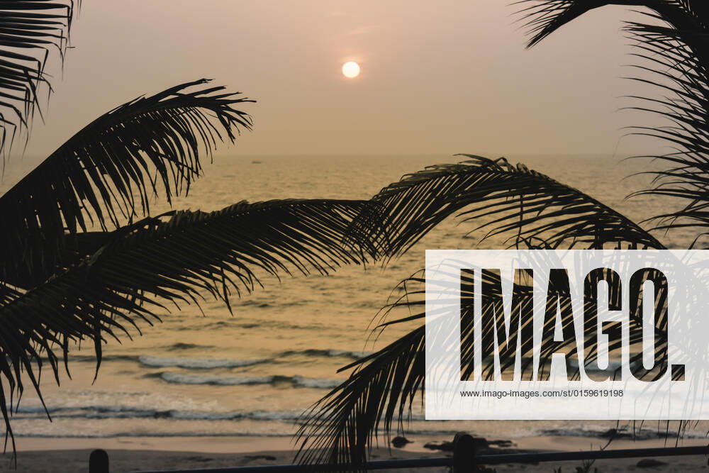 Panorama landscape view of a beautiful tropical sea beach in sunset time during christmas holiday. ( MUMBAI, MAHARASTRA, INDIA). Travel vacation and holiday concept. , 27404340.jpg, silhouette, vacation, sunrise, resort, summer, sun, sky, paradise, palm-tree, travel, coconut, orange, nature, exotic, dusk, trees, yellow, island, ocean, evening, background, light, twilight, sunlight, scenery, tranquil, scene, water, leaf, sundown, golden, caribbean, maldives, tropic, coastal-sand, thailand, holiday, colorful, shore-coast, asia, lagoon, miami, hawaii, islands, bali, morning, lucia, bahamas, jamaica, wave,