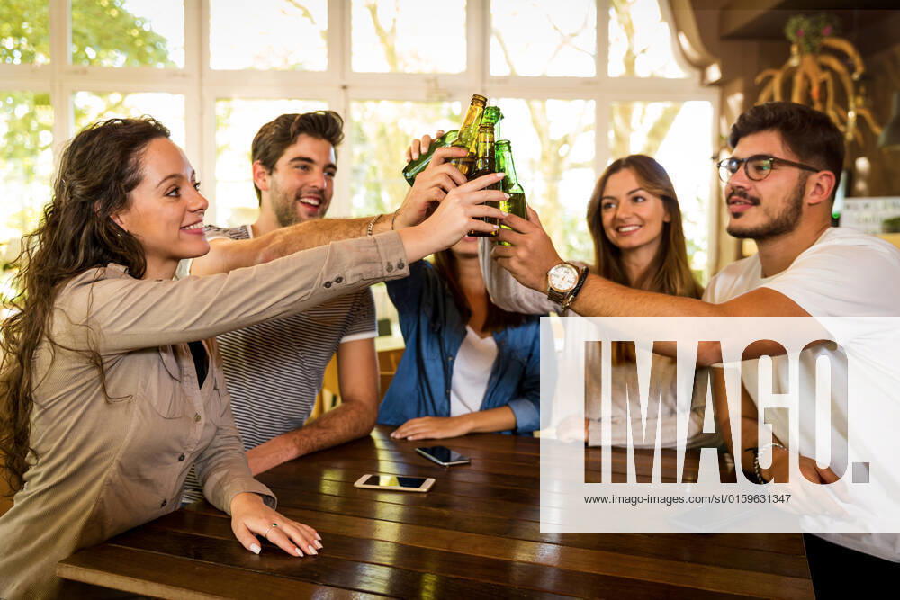 Group of friends hanging out and making a toast with beer, model released, , 27434040.jpg, group, friends, friendship, drinking, toast, beer, hangout, pub, cheers, celebrate, meeting, happiness, drinks, coffeeshop, people, cafe, fun, coffee, together, shop, couples, casual, happy, lifestyle, smiling, portrait, buddy, party, relaxing, talking, beverage, caucasian, laughing, restaurant, sitting, relax, table, indoor, interior, women, man, young, communication, hispanic, latino-american, latino,