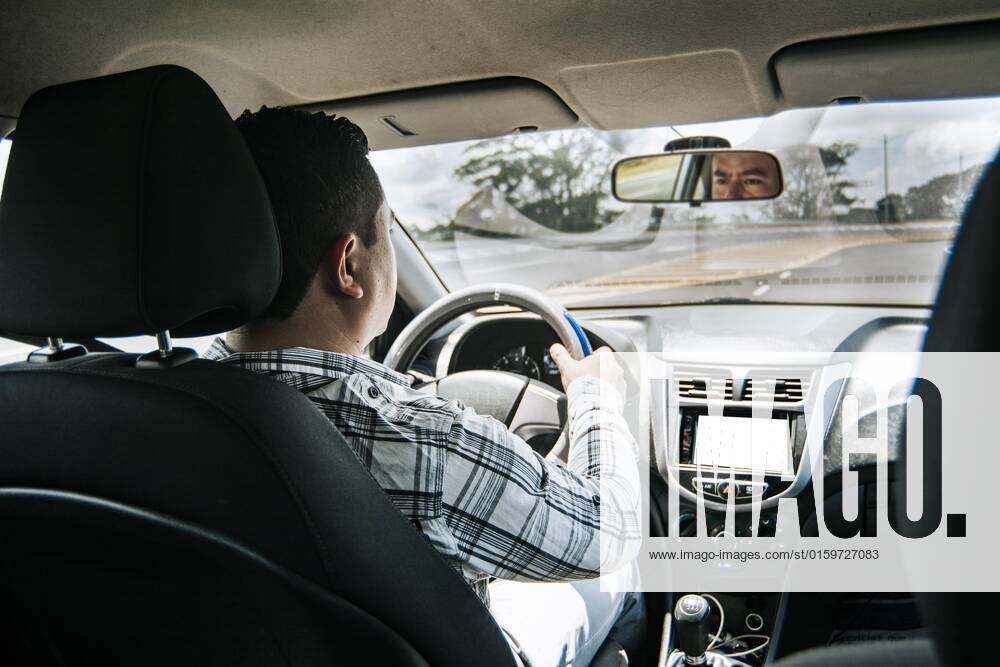 Rear view one Man on Tax one Cars, Hands of Man on Tax of Cars, Interior view one Man on Tax one Cars, Concept the Hands on Tax one Cars