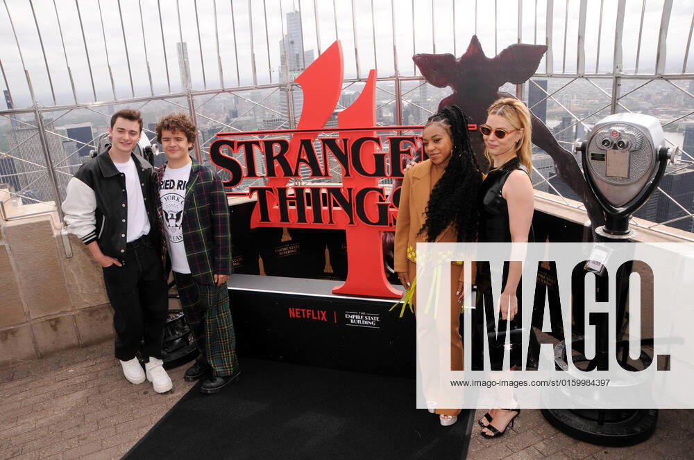 Noah Schnapp, Gaten Matarazzo, Priah Ferguson and Cara Buono visit the Empire State Building to celebrate Stranger Things season 4 in New York City. New York United States - ZUMAs197 20220526_zaa_s197_127