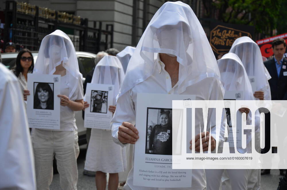 Gays Against Guns Rally in NYC March participants are seen holding photos of deceased children and marching to Times Square, New York City to demand better gun laws and to ask everyone to come out as a gun violence prevention advocate on May 26, 2022. New York New York United States