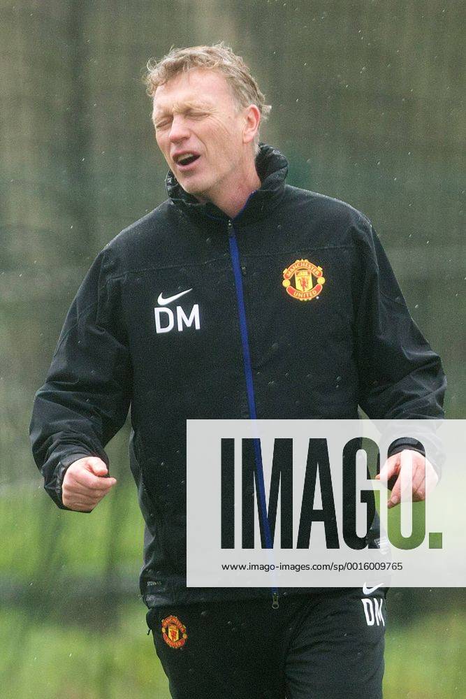 David Moyes, manager of Manchester United looks dejected during training - UEFA Champions League - Manchester United Training - Aon Carrington Training Complex - Manchester - England - 18th March 2014 - Picture Philip Oldham Sportimage .