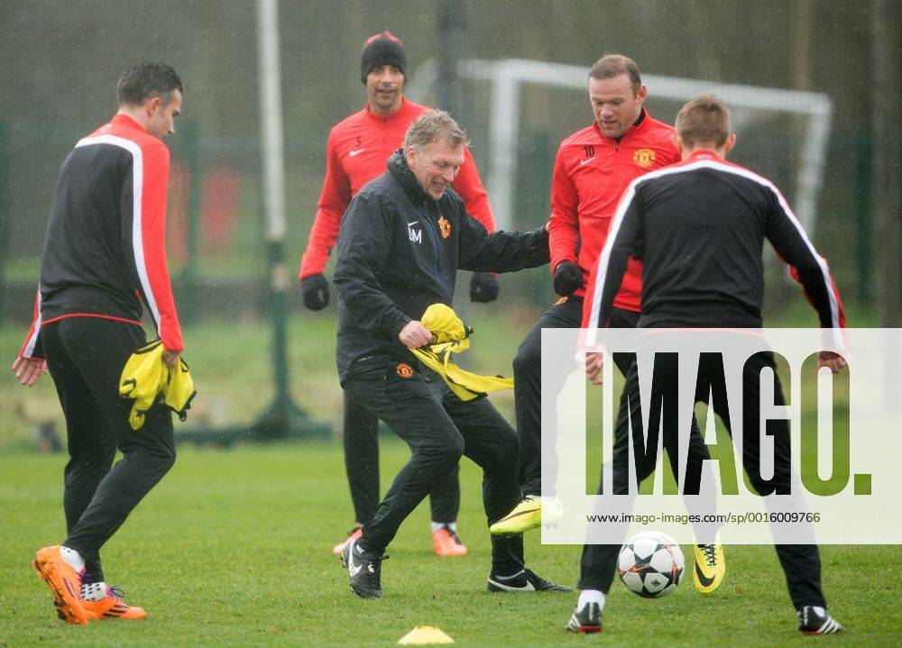 David Moyes, manager of Manchester United and Wayne Rooney in action - UEFA Champions League - Manchester United Training - Aon Carrington Training Complex - Manchester - England - 18th March 2014 - Picture Philip Oldham Sportimage .