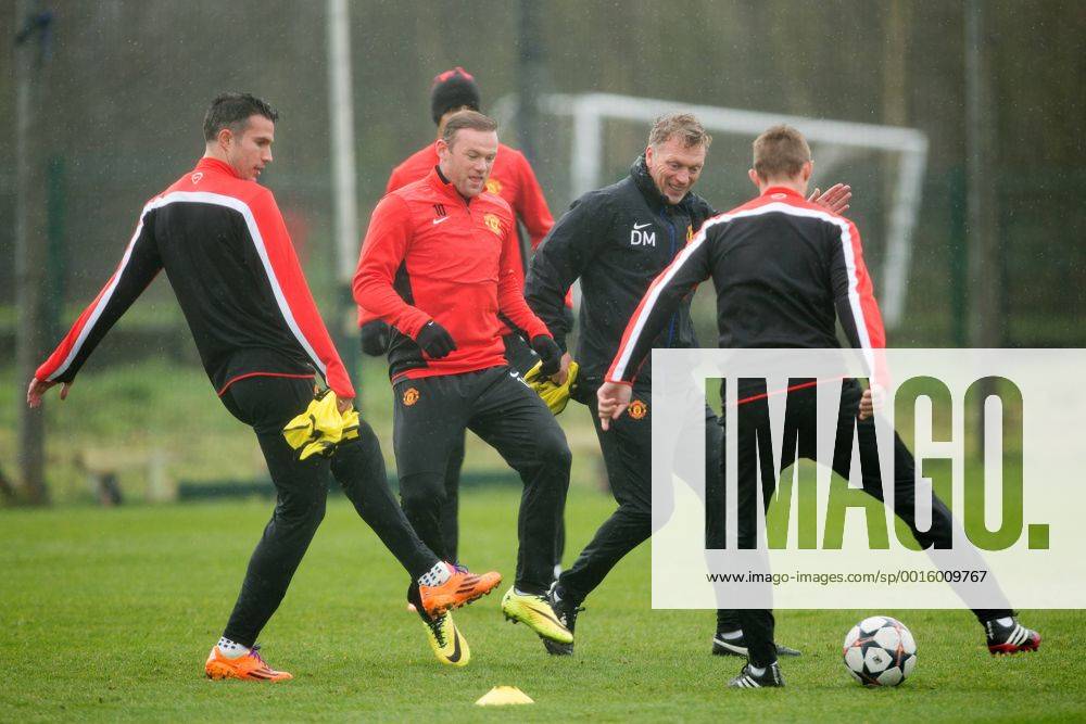 David Moyes, manager of Manchester United and Wayne Rooney in action - UEFA Champions League - Manchester United Training - Aon Carrington Training Complex - Manchester - England - 18th March 2014 - Picture Philip Oldham Sportimage .