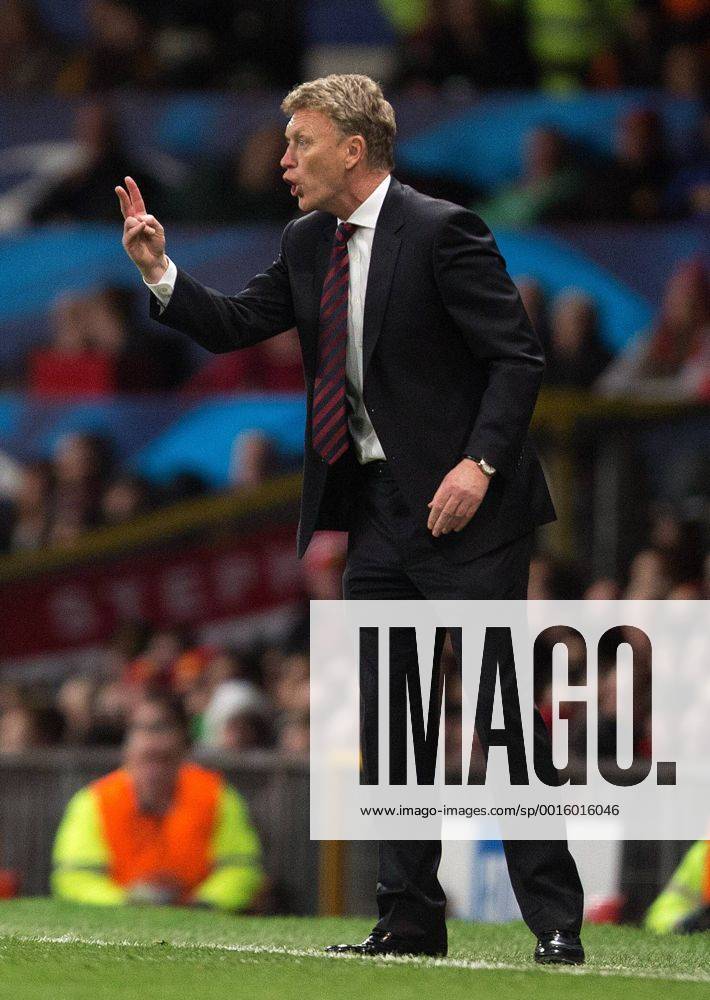 David Moyes, manager of Manchester United - UEFA Champions League Round of 16 - Manchester United vs. Olympiacos - Old Trafford - Manchester - England - 19th March 2014 - Picture Philip Oldham Sportimage .