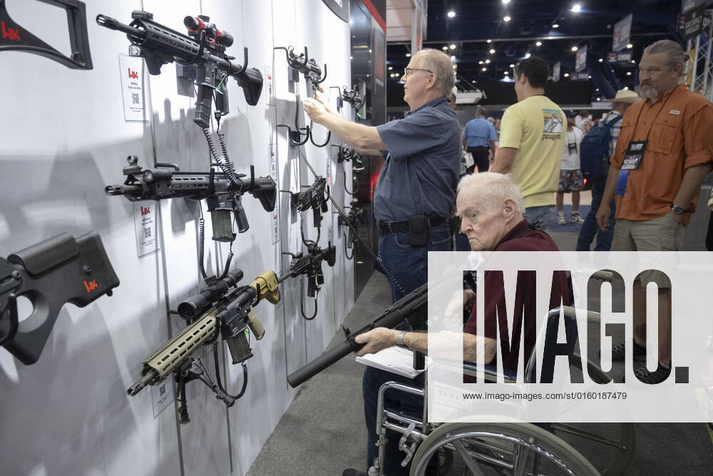 Gun enthusiasts shop for firearms, ammunition and outdoor products at the HK booth on Saturday morning at the National Rifle Association s (NRA) trade show. The exhibits cover almost 14 acres inside the George R. Brown Convention Center. Houston USA - ZUMAd150 20220528_mda_d150_375