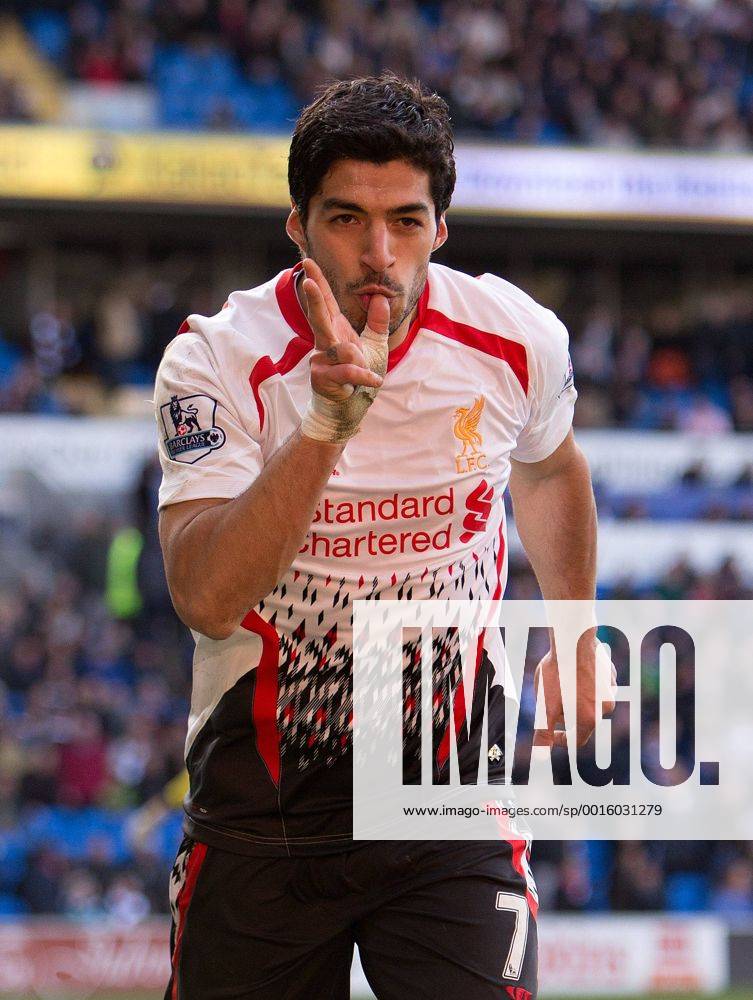 Luis Suarez of Liverpool celebrates scoring his sides sixth goal - Barclays Premier League - Cardiff City vs. FC Liverpool - Cardiff City Stadium - Cardiff - Wales - 22nd March 2014 - .