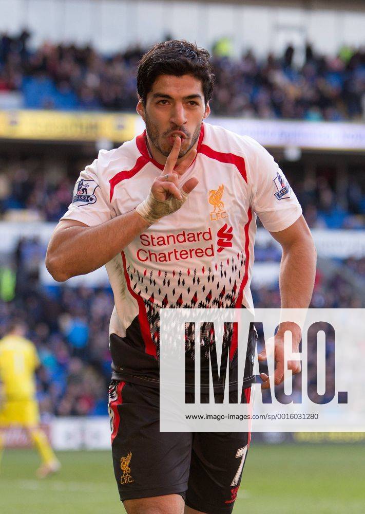 Luis Suarez of Liverpool celebrates scoring his sides sixth goal - Barclays Premier League - Cardiff City vs. FC Liverpool - Cardiff City Stadium - Cardiff - Wales - 22nd March 2014 - .