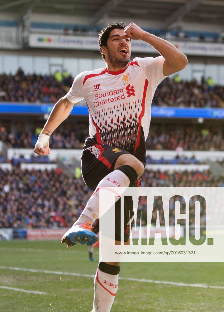 Luis Suarez of Liverpool celebrates scoring his sides fourth goal - Barclays Premier League - Cardiff City vs. FC Liverpool - Cardiff City Stadium - Cardiff - Wales - 22nd March 2014 - .