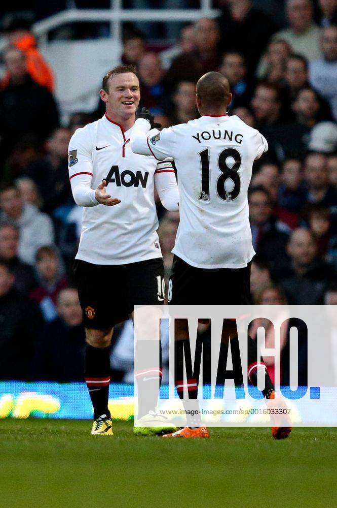 Manchester United s Wayne Rooney celebrates scoring his side s 2nd goal with Manchester United s Ashley Young - West Ham United v Manchester United (ManU) - Barclays Premier League - Upton Park Stadium - London - 22nd March 2014 - .