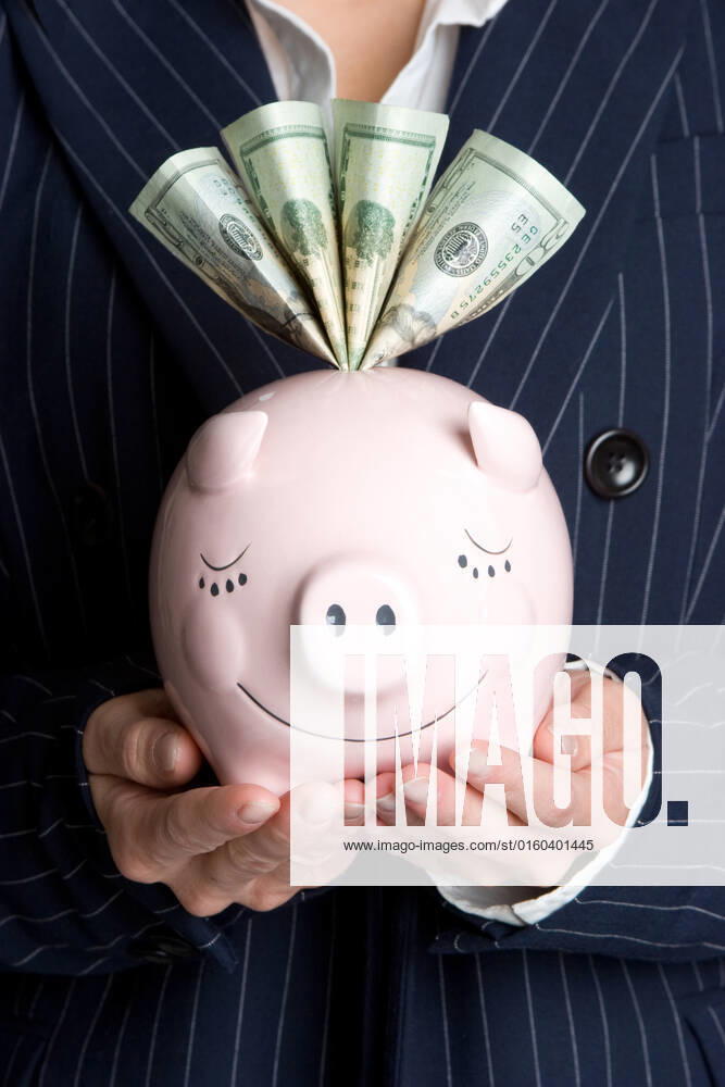 Business woman holding piggy bank, model released, , 2029437.jpg, adult, bank, banking, bills, budget, business, businessperson, businesswoman, cash, cheerful, currency, cute, dollars, finances, financial, girl, hands, happiness, happy, holding, joy, joyful, money, nose, notes, piggy, piggybank, pink, planing, professional, retirement, save, savings, smart, smiling, suit, wealth, wise, woman,
