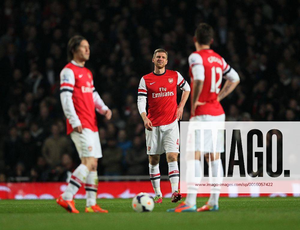 Arsenal s Per Mertesacker looks on dejected after going 1-0 down Arsenal vs Swansea City - Premier League - Emirates Stadium- London - England - 25 03 2014 - Pic David Klein Sportimage .