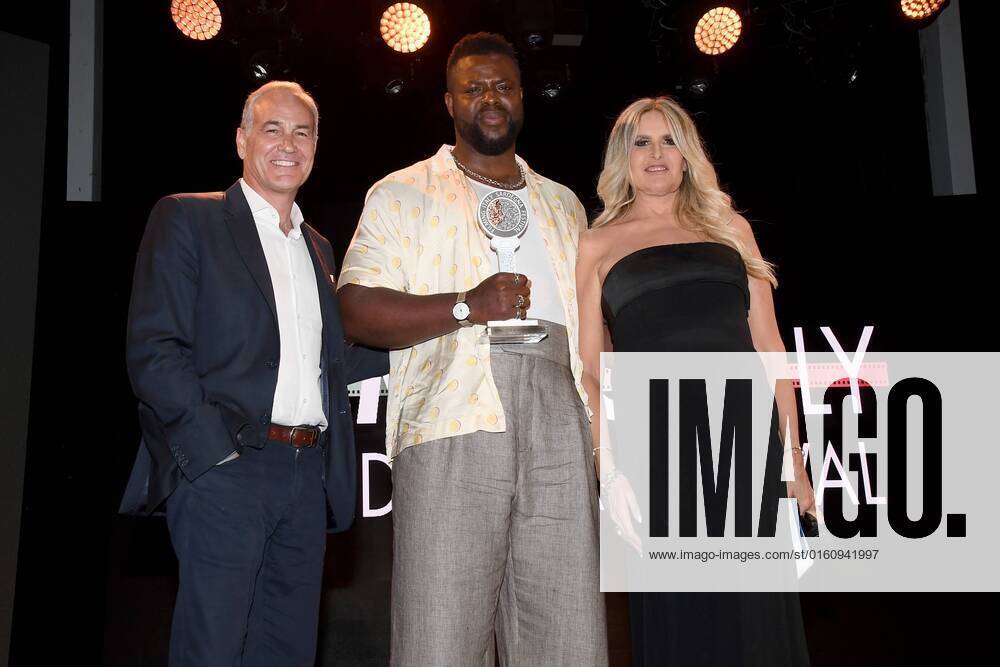 Santa Margherita di Pula. Forte Village. Final evening Filming Italy Sardegna Festival. Pictured: Winston Duke and Tiziana Rocca