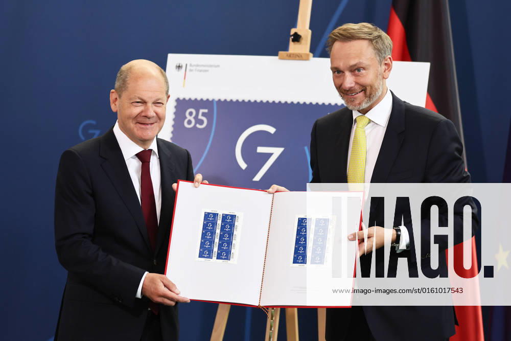 Federal Chancellor Olaf Scholz and Federal Minister of Finance Christian Lindner during the presentation of the special postage stamp G7 Presidency in Chancellery in Berlin on 15 June 2022 presentation of the special postage stamp G7 Presidency