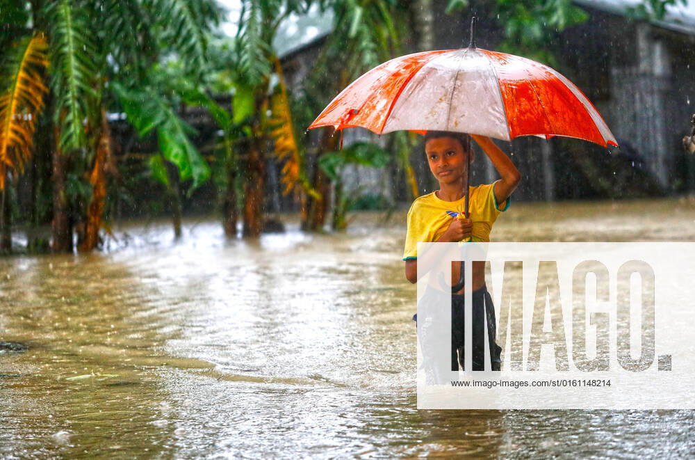 (220618) -- SYLHET, June 18, 2022 -- A boy wades through a flooded area in Sylhet, Bangladesh, on June 18, 2022. Bangladeshi soldiers were deployed on Friday to help the country s Sylhet region, some 240 km northeast of the capital Dhaka, tackle its worsening flood situation. Troops were sent to deal with rising water levels in the Sylhet and Sunamganj district, 296 km northeast of the capital Dhaka, caused by seasonal rains and a heavy rush of water from neighboring India. BANGLADESH-SYLHET-FLOOD Salim