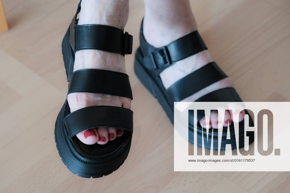 Dusseldorf 19 06 2022 Ugly Dad women shoes ugly chunky sandals edgy look platform sole red nail polish pedicure Dusseldorf North Rhine Westphalia Germany
