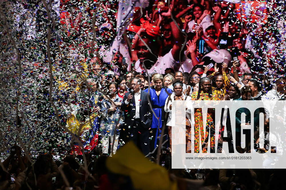(220620) -- BOGOTA, June 20, 2022 -- Gustavo Petro, presidential candidate of the leftist Historic Pact for Colombia coalition, celebrates with his running mate Francia Marquez after winning the Colombian presidential elections in Bogota, Colombia, June 19, 2022. Gustavo Petro was elected president of Colombia on Sunday after defeating independent candidate Rodolfo Hernandez in the second round of elections in a very close race, the state-run National Civil Registry reported. (Photo by Xinhua) COLOMBIA-BOGOTA-PRESIDENTIAL ELECTION JhonxHeaverxPaz