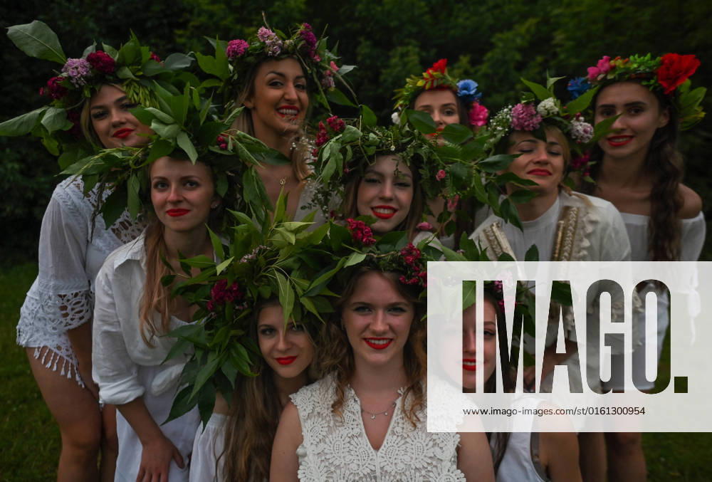 Kupala Night - Summer Solstice Celebration In Poland A group of young women, from Slavica Dance Group, in a flower wreaths posees for a photo during the Kupala Night celebrations, the Slavic summer solstice festival, at Lisia Gora nature reserve in Rzeszow. On Tuesday, June 21, 2022, in Rzeszow, Podkarpackie Voivodeship, Poland. Rzeszow Poland