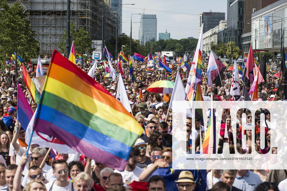 A crowd marches through Warsaw during the Warsaw Pride. The Kyiv Pride organisation joined the march of the Equality Parade in Warsaw to mark their 10th anniversary and Ukrainian LGBTQ+ people s rights. Warsaw and Kyiv Pride are marching together in Polish capital this year, because of the Russian invasion in Ukraine. The Warsaw Pride, also known as the Equality Parade, brought thousands of people to the streets of Warsaw, to spread the ideas of freedom, equality and tolerance. Warsaw Poland - ZUMAs197 20220625_zaa_s197_165