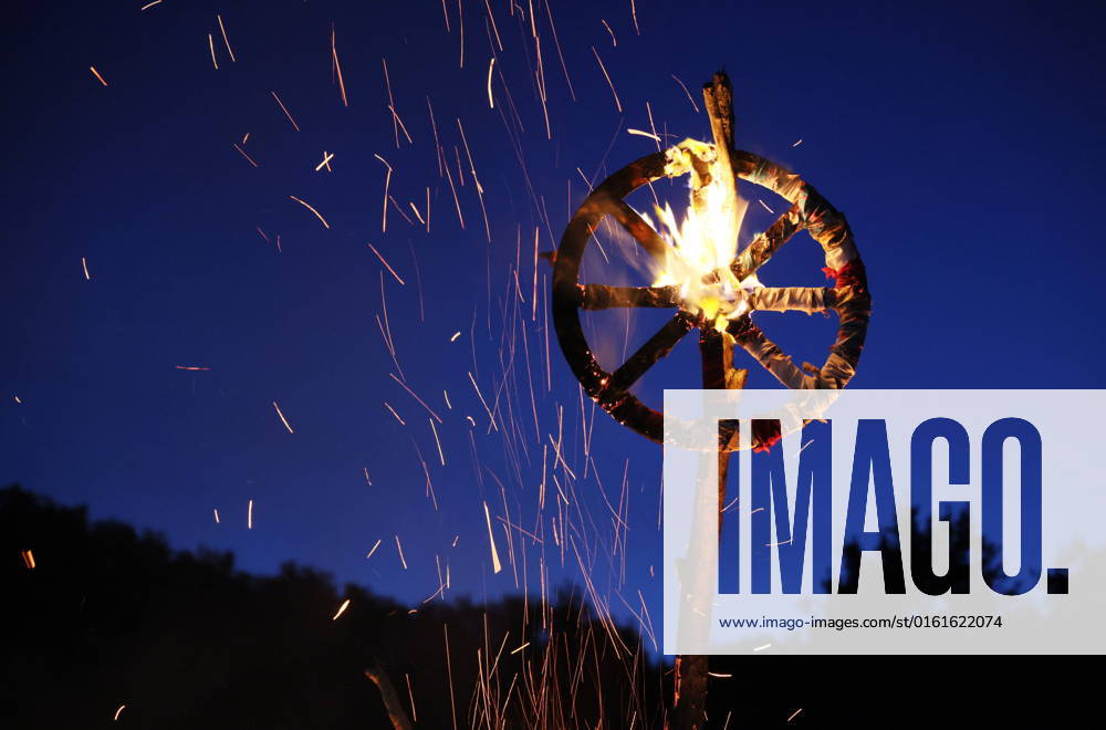 KRASNODAR TERRITORY, RUSSIA – JUNE 25, 2022: Burning a solstice sign during the Kupala na Kubani festival of Slavic culture in the village of Vozrozhdeniye. Dmitry Feoktistov TASS TS137C1A