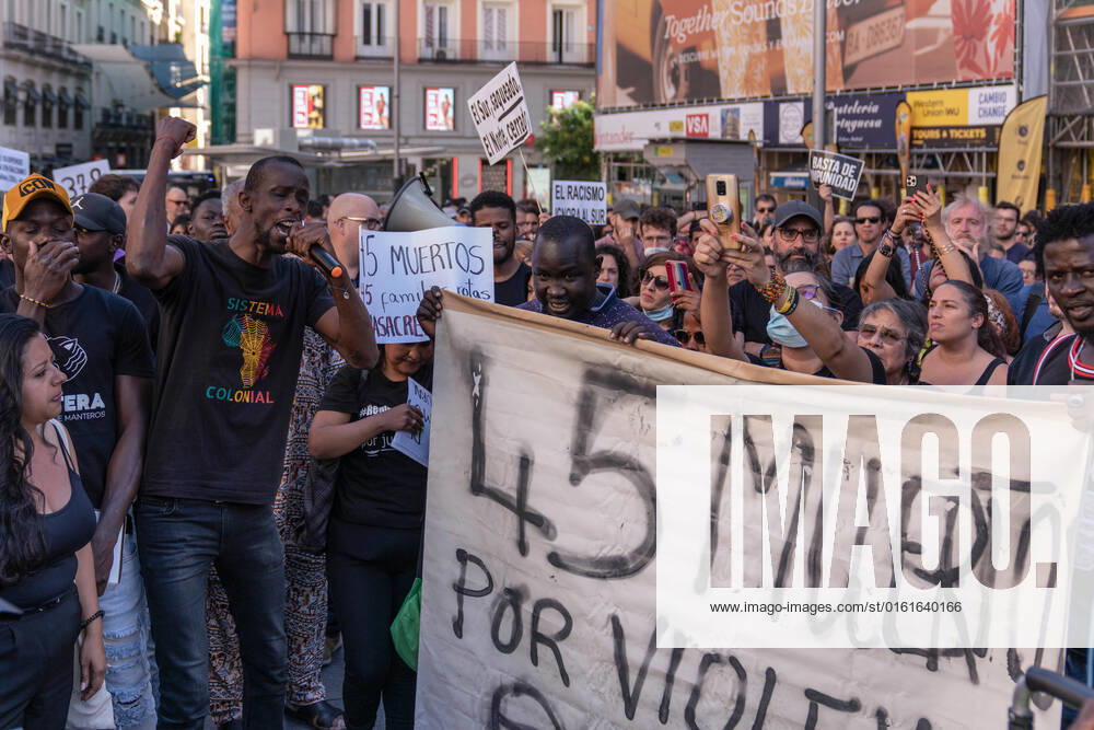 Serigne Mbaye, Podemos deputy in the Madrid Assembly, in Plaza Callao chants slogans during the rally. The Madrid Anti-Racist Movement, Assembly and RegularizacionYa organised a rally against the massacre in Melilla..At least 37 people died on Friday in an attempt to jump the fence of the autonomous city, the greatest tragedy recorded at this border. They died from suffocation or crushing, although several deaths occurred when they fell from the top of the fence. Madrid Spain - ZUMAs197 20220626_zaa_s197_191