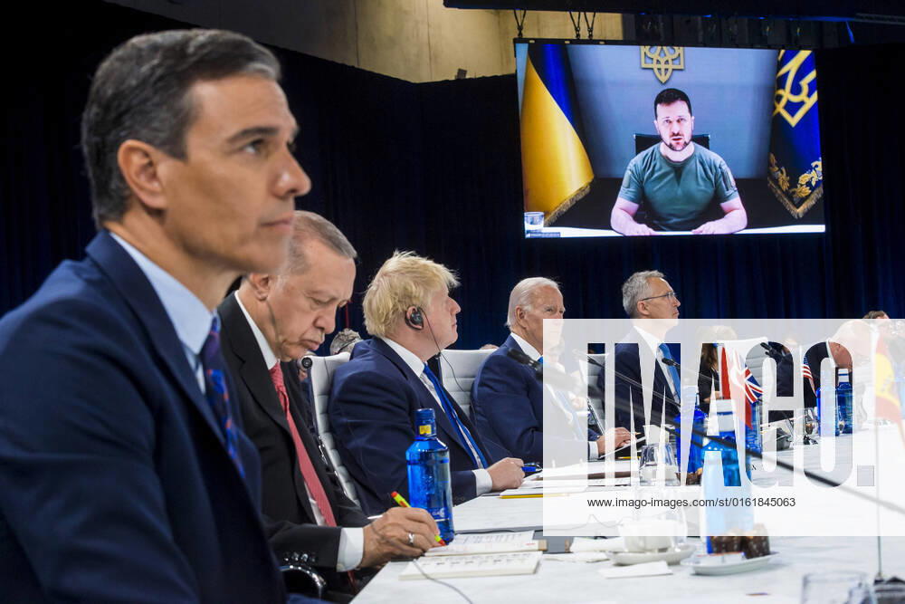 NATO heads of state and governments listen on as Ukrainian President Volodymyr Zelenskyy addresses the NATO summit in Madrid, Spain, on Wednesday, June 29, 2022. Photo via NATO WAX2022063009 NATO