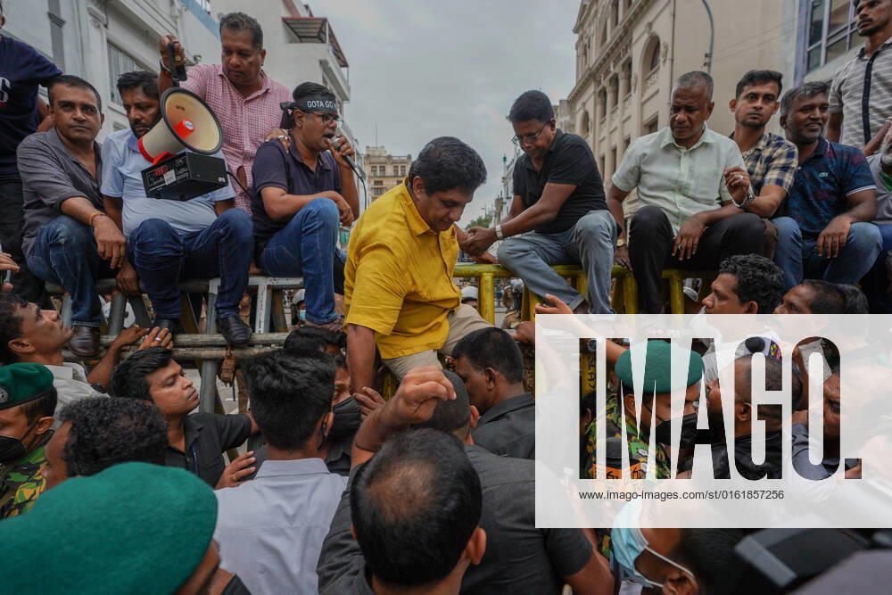 Opposition Protests Demanding The Resignation Of President Gotabhaya Rajapaksa Opposition leader Sajith Premadasa tries to climb the barricade amid opposition protests demanding the resignation of President Gotabhaya Rajapaksa. June 30, 2022 Colombo, Sri Lanka Colombo Sri Lanka