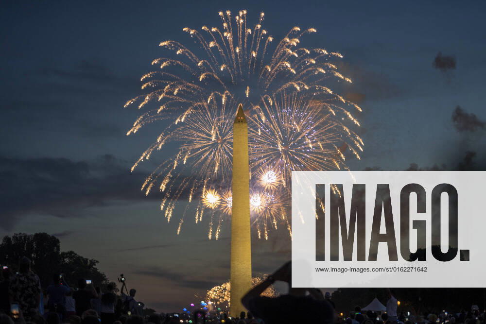 Fireworks go off near the Washington Monument on the National Mall as people celebrate America s 246th Independence Day in Washington D.C., Monday, July 4, 2022. Earlier in the day there was a deadly shooting during a July 4th parade in Chicago. WAS20220704520 KenxCedeno