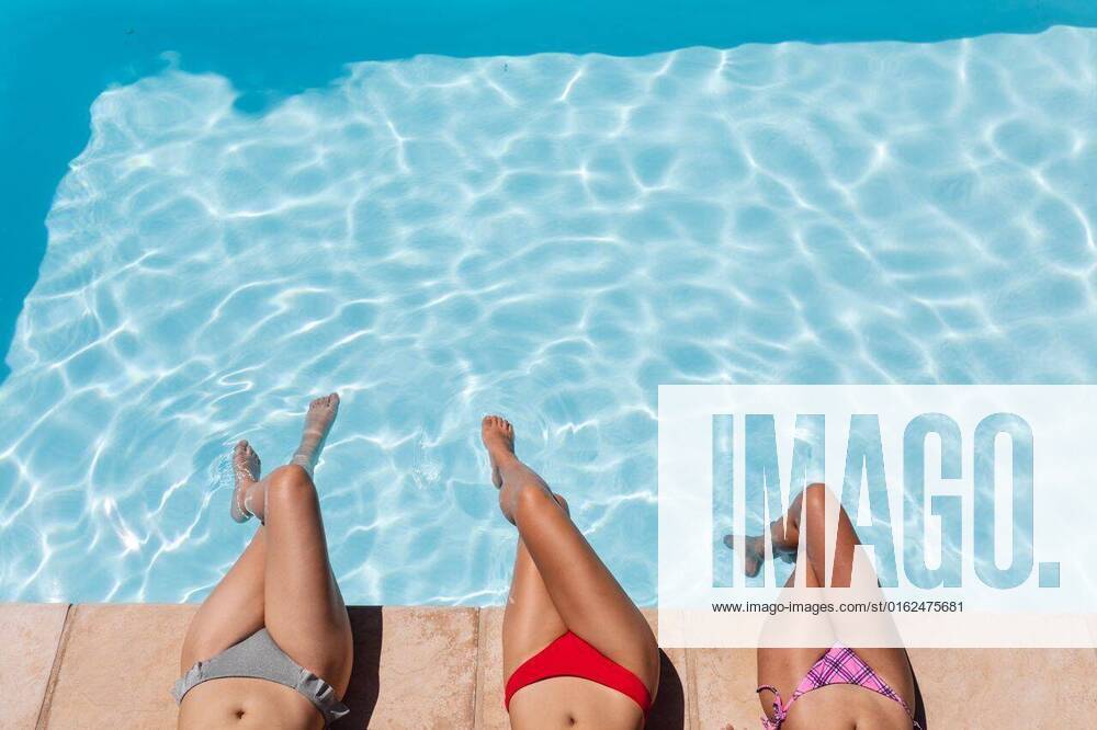 Diverse group of female friends sunbathing by pool on a sunny day Diverse group of female friends sunbathing by pool on a sunny day. Hanging out and relaxing outdoors in summer., model released, , property released, Cape Town, South Africa, 14.01.2021, 1404887.jpg, people,diverse group,female,friend,sunbathing,pool,sunny day,hanging,relaxing,swimming pool,outdoors,summer,vacation,outdoor,landscape,travel,beautiful,sky,green,leisure,park,sea,sunny,lifestyle,spring,day,swimming,tourism,sun,diverse,group Young Adult,Woman,Female,Mixed-Race,Chinese