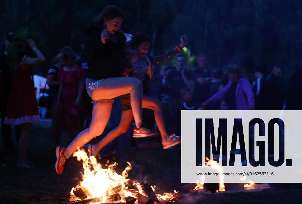 Girls jump over a bonfire during Ivan Kupala Day celebrations at the Tomskaya Pisanitsa open-air museum in Kemerovo Region s Yashkinsky District, some 50 km northwest of Kemerovo. Maxim Kiselev TASS TS1397A1