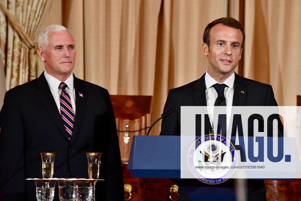 French President Emmanuel Macron flanked by Vice President Pence delivers remarks at the state luncheon at the U.S. Department of State in Washington, D.C. on April 24, 2018.