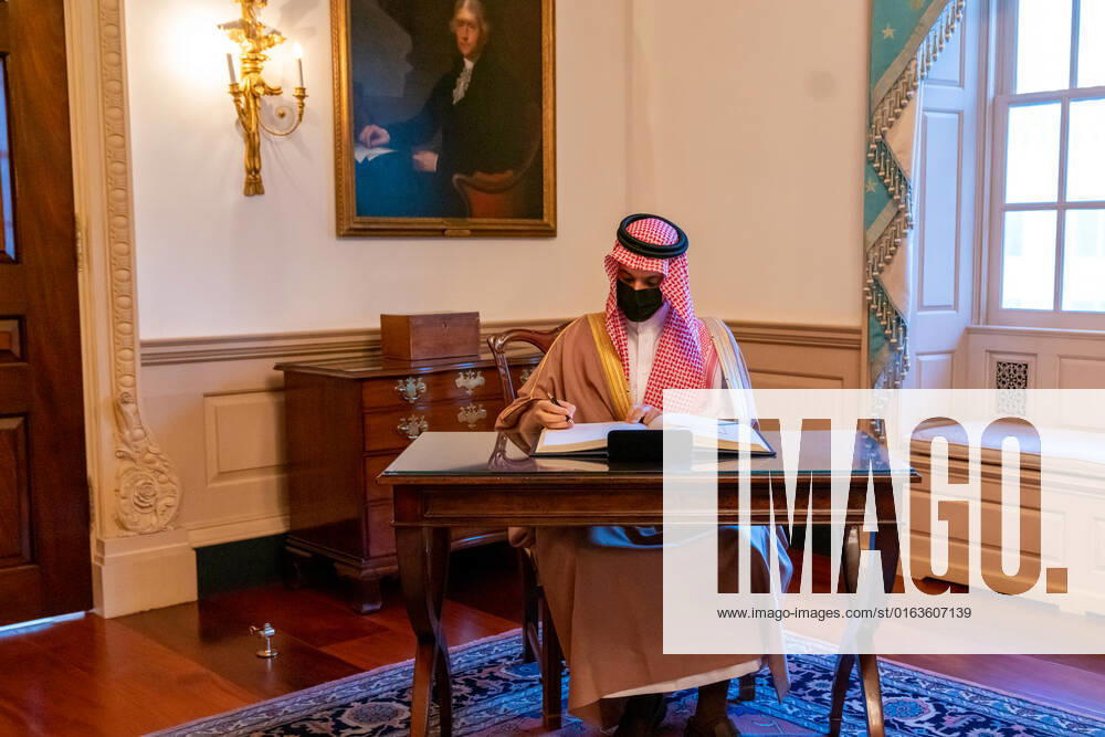 Saudi Foreign Minister Prince Faisal bin Farhan Al Saud signs Secretary of State Michael R. Pompeo s guestbook before their bilateral meeting at the U.S. Department of State in Washington, D.C., on October 14, 2020.