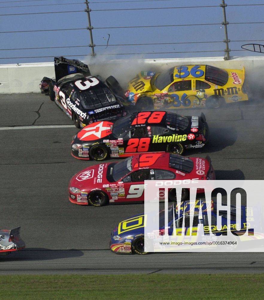 Feb. 18, 2001 - U.S. - (KRT3) KRT SPORTS STORY SLUGGED: NASCAR-EARNHARDT KRT PHOTOGRAPH BY JACOB LANGSTON ORLANDO SENTINEL (February 18) DAYTONA BEACH, FLA-- Dale Earnhardt (3) crashes into the wall in turn four, collecting the car of Ken Schrader (36) on the last lap of the Daytona 500. Earnhardt crashed in the last lap of today s Daytona 500 and was sent to the hospital. Earnhardt, a seven-time NASCAR Motorsport USA Winston Cup champion, died of injuries resulting in the last lap of the race. He was 49. (OR) AP PL KD BL 2001 (Vert) (lde) (Additional photos available on KRT Direct, KRT PressLink or upon request) -- NO MAGS, NO SALES UNTIL MARCH 4 News Archive - Feb. 18, 2001 - ZUMAm67