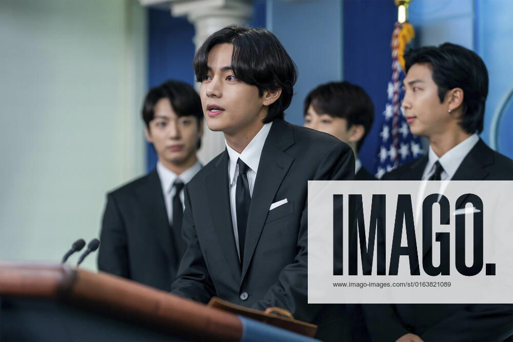 K-Pop band BTS member Kim Tae-hyung, known as V, joins White House Press Secretary Karine Jean-Pierre in the James S. Brady Press Briefing Room of the White House, May 31, 2022, in Washington, D.C. Washington United States of America - ZUMAp138 20220531_zaa_p138_040